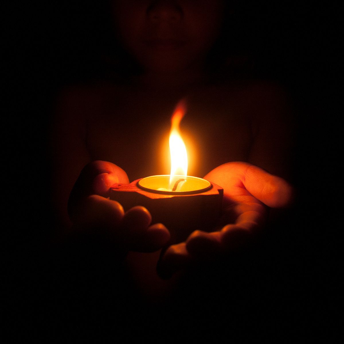 What is the spiritual meaning when the candle flame is too high