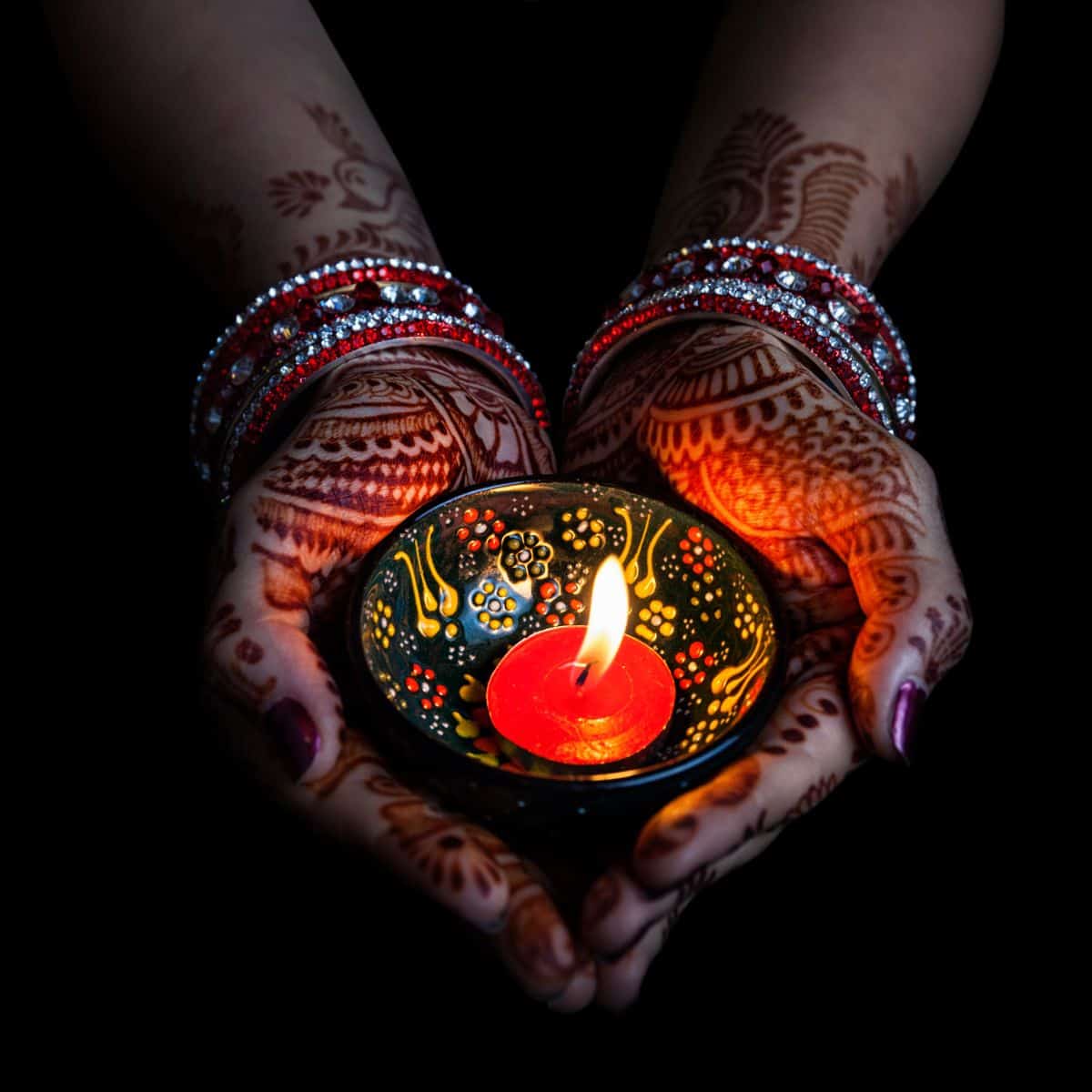 What causes a candle flame to dance
